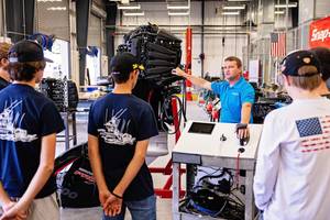Torey Roberts, Mercury technical accounts manager, speaks with students at Fred K. Marchman Technical College in New Port Richey, Fla. (Photo: Mercury Marine)