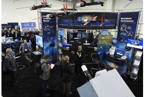 Rear Adm. Mat Winter, chief of naval research, holds a press conference at the ONR exhibit during the 2016 Sea-Air-Space Exposition. (U.S. Navy photo by John F. Williams)