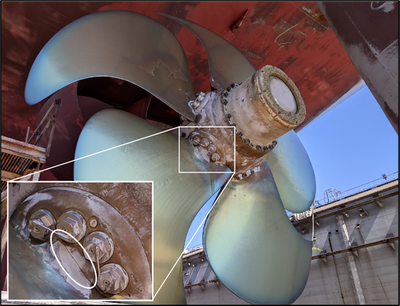 The five-bladed controllable pitch propeller on the Maunalei showing a fracture (inset) at the base of the no. 4 blade. (Source: U.S. Coast Guard)