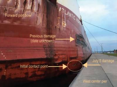 Postaccident photo of the Atlantic Huron alongside the west center pier. Point of contact and damage are indicated by arrows. (Source: US Coast Guard)