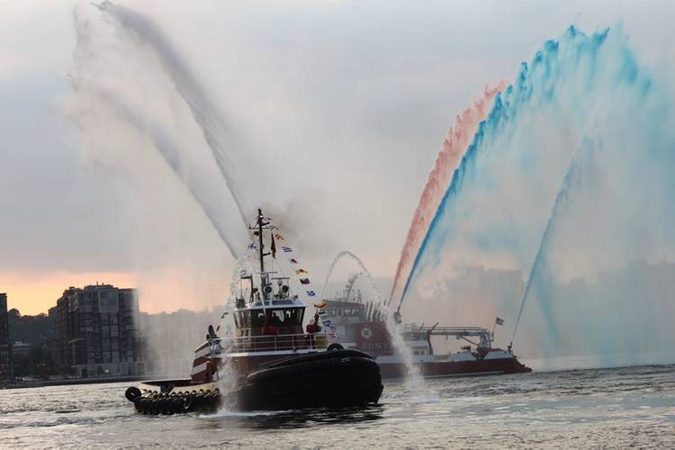 After the christening, the NYFD Fireboat 343 helps celebrate with red, white and blue streams of water. . (Photo: Greg Trauthwein)