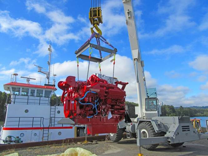 One of the two new Cummins QSK38 engines being swung in (Photo: Mike Fourtner / Cummins)