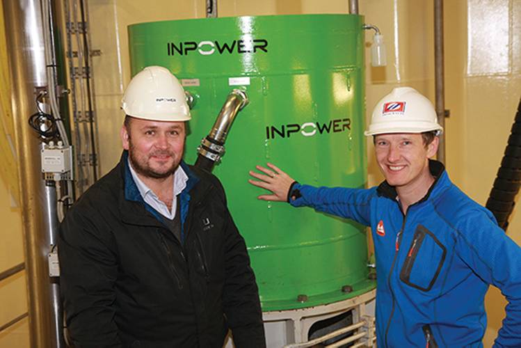 In its former life, Uksnoy “We know the market outlook for next year isn’t bright, but we expect to have a good year.  We’re optimistic.”  Uksnoy chief executive  Oystein Uksnoy (left) with  an Inpower representative. Shipping’s seismic support vessel Rig Adromeda was a Turkish-built chemical tanker,  converted to an Offshore Service Vessel with a twist: an innovative permanent-magnet propulsion system from Inpower. (Photo courtesy Uksnoy Shipping)