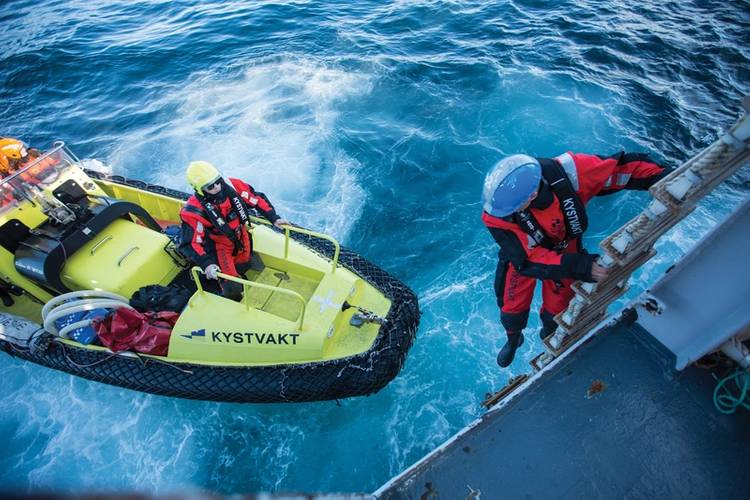 Inspection: (above and below) the Norwegian Coast Guard, or Kystvakten, disembark and check forms following a vessel inspection. Image: The Norwegian Coast Guard