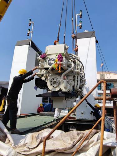 Lowering one of the new engines into the Jaladharanuraksh. Image courtesy Cummins/Thai Marine Department