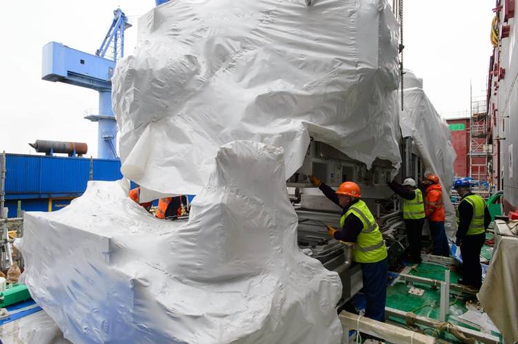 Aft Gas Turbine Installation on the Prince of Wales QEC Aircraft Carrier. Rolls Royce Turbiine is installed, followed by the Alternator. (Photo: John Linton)