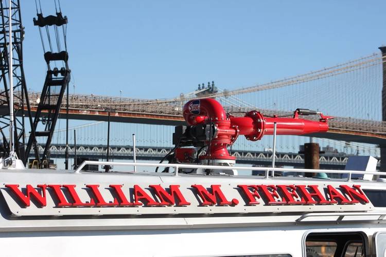 The vessel’s nameplate, displayed prominently alongside the cabin, is milled from an I-beam lifted from the rubble of the World Trade Center. (Photo: Greg Trauthwein)