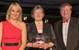 Alexis Lay of LEK Lubrication, centre, collects her award from MMIA17 host Louise Minchin and Paul Marwick of award sponsor the Manufacturing Technology Centre (Photo: LEK Lubrication Systems)